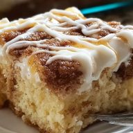 Cinnamon Roll Poke Cake