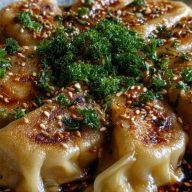 Oven-Baked Dumplings with Peanut Sauce