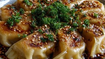 Oven-Baked Dumplings with Peanut Sauce